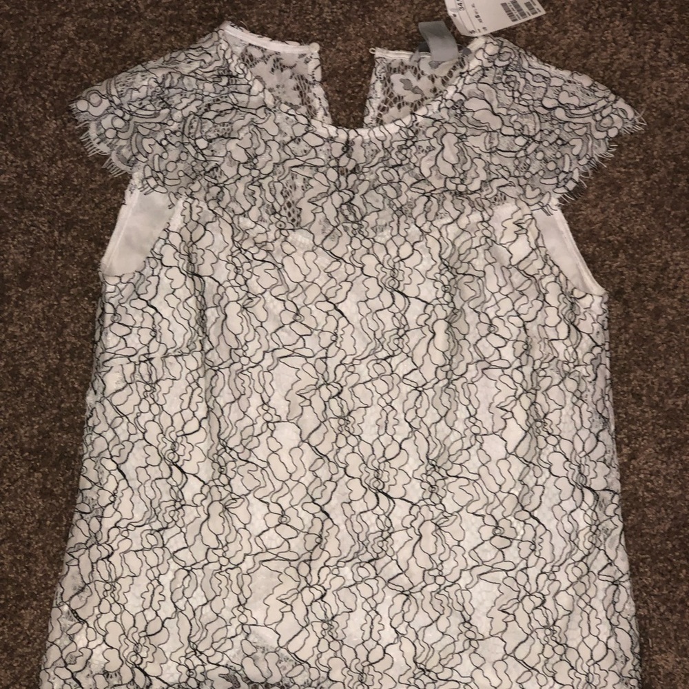 White and black lace blouse